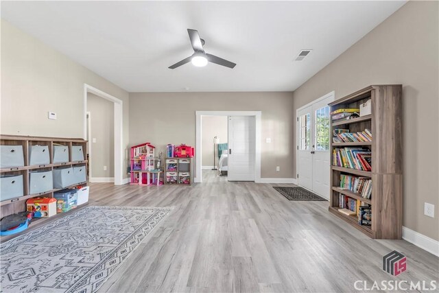 1810 Willow Creek Dr, Watkinsville, GA 30677 - playroom with wood finished floors, a ceiling fan, and baseboards