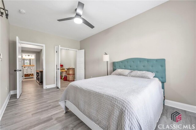 1810 Willow Creek Dr, Watkinsville, GA 30677 - bedroom featuring wood finished floors, baseboards, ceiling fan, and a closet