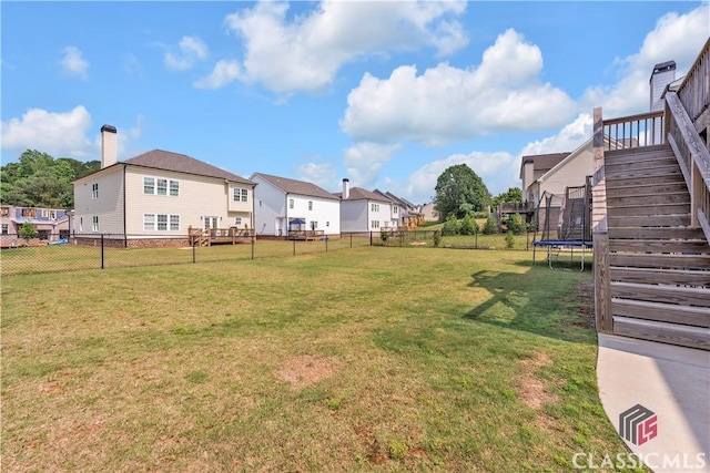 1810 Willow Creek Dr, Watkinsville, GA 30677 - view of yard with a trampoline, a residential view, and stairway