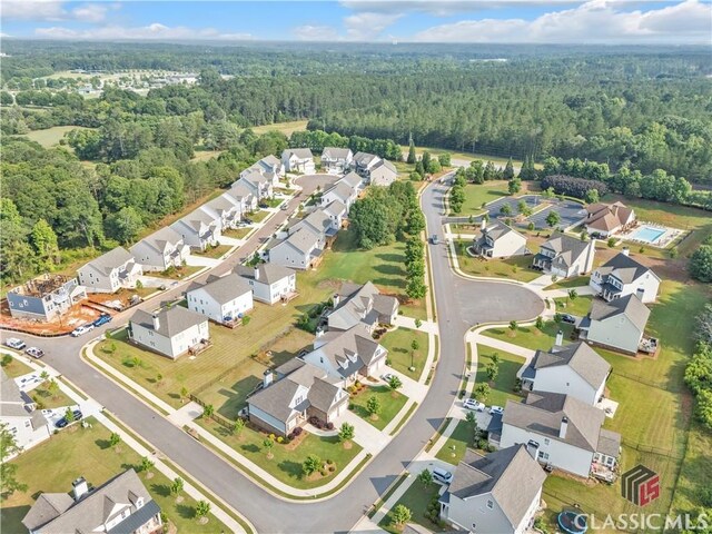 1810 Willow Creek Dr, Watkinsville, GA 30677 - aerial view of property and surrounding area featuring a forest and nearby suburban area