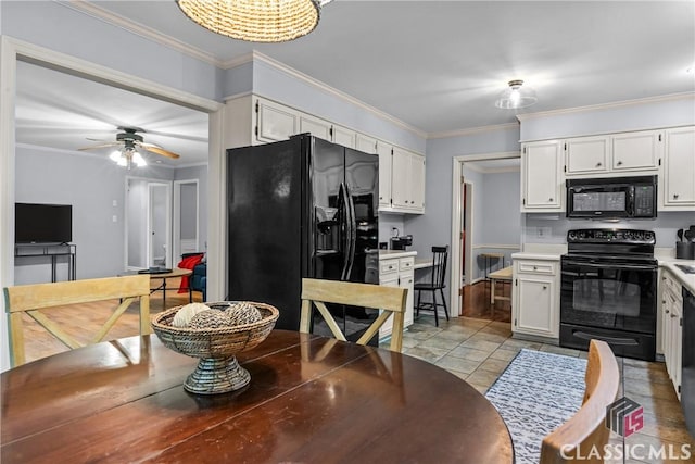 161 Pinecrest Ter, Athens, GA 30606 - kitchen with black appliances, white cabinetry, crown molding, a ceiling fan, and light countertops