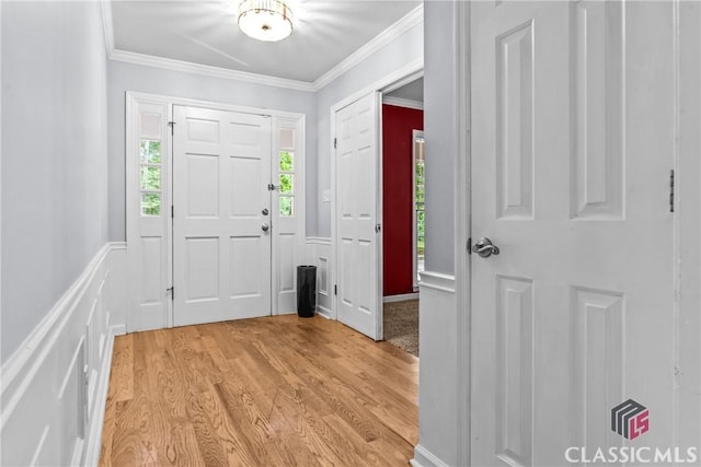 161 Pinecrest Ter, Athens, GA 30606 - foyer featuring crown molding, light wood finished floors, and a wainscoted wall
