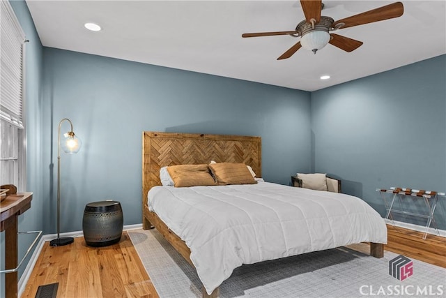 161 Pinecrest Ter, Athens, GA 30606 - bedroom with baseboards, wood finished floors, a ceiling fan, and recessed lighting