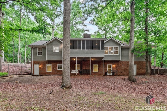 161 Pinecrest Ter, Athens, GA 30606 - rear view of property with a sunroom, a chimney, and brick siding