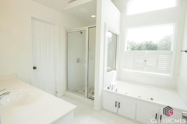 1851 Harvest Way, Loganville, GA 30052 - full bathroom with a tub with jets, a stall shower, tile patterned floors, and vanity