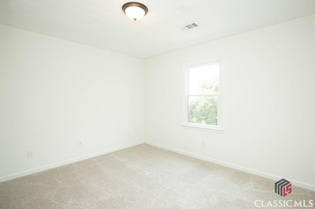 1851 Harvest Way, Loganville, GA 30052 - unfurnished room featuring light carpet and baseboards