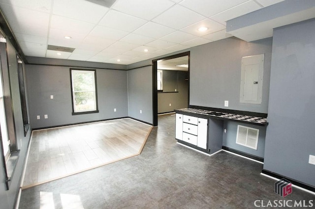 1851 Harvest Way, Loganville, GA 30052 - empty room with electric panel, baseboards, and a paneled ceiling