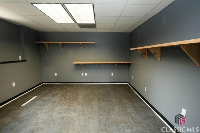 1851 Harvest Way, Loganville, GA 30052 - empty room with a paneled ceiling, carpet flooring, and baseboards