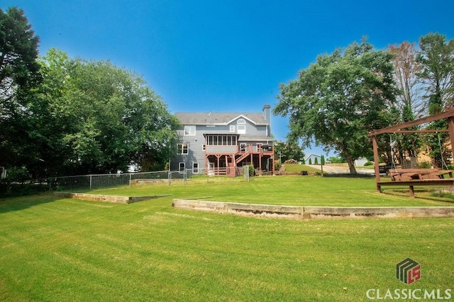 1851 Harvest Way, Loganville, GA 30052 - view of yard featuring a deck
