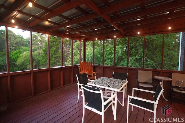 1851 Harvest Way, Loganville, GA 30052 - sunroom / solarium featuring hardwood / wood-style flooring, a deck, and outdoor dining area