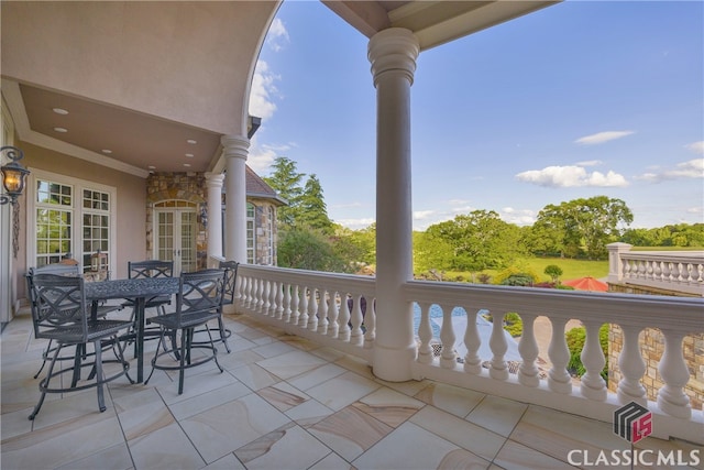 3881 Sims Bridge Rd, Monroe, GA 30656 - view of patio with a balcony and outdoor dining space