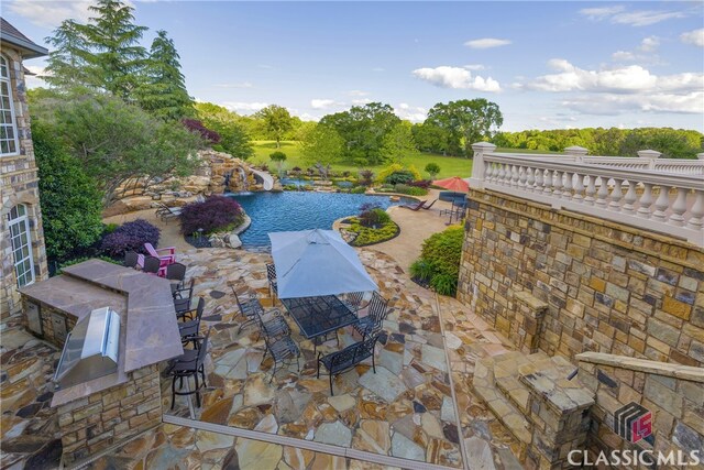3881 Sims Bridge Rd, Monroe, GA 30656 - view of patio featuring an outdoor pool and view of scattered trees