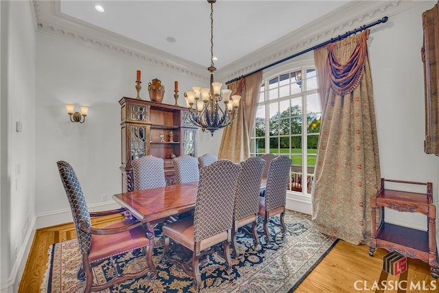 3881 Sims Bridge Rd, Monroe, GA 30656 - dining room with a chandelier, wood finished floors, ornamental molding, baseboards, and recessed lighting