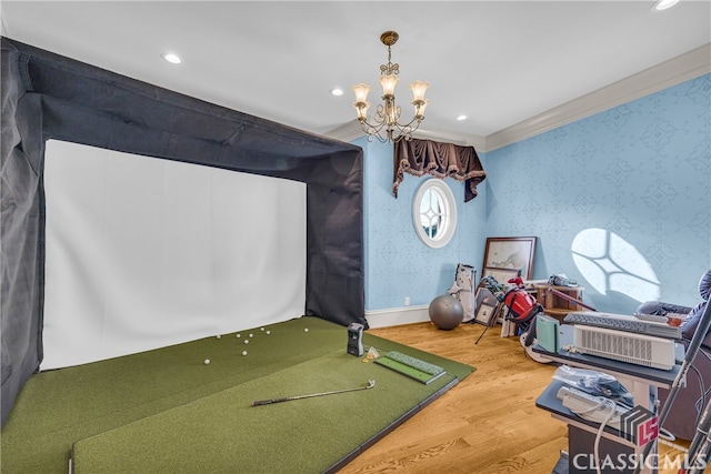 3881 Sims Bridge Rd, Monroe, GA 30656 - game room with wallpapered walls, wood finished floors, a chandelier, recessed lighting, and ornamental molding