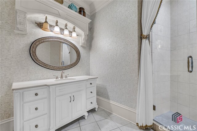 3881 Sims Bridge Rd, Monroe, GA 30656 - full bath featuring a tile shower, vanity, tile patterned flooring, and wallpapered walls