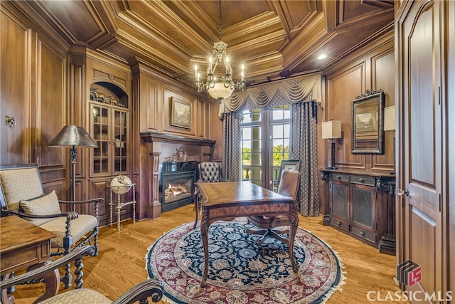 3881 Sims Bridge Rd, Monroe, GA 30656 - home office featuring crown molding, wood ceiling, a glass covered fireplace, wooden walls, and a decorative wall