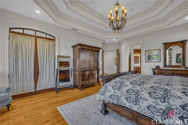 3881 Sims Bridge Rd, Monroe, GA 30656 - bedroom with a chandelier, crown molding, and light wood-style flooring