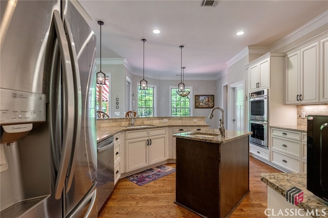 1641 Lane Creek Rd, Bogart, GA 30622 - kitchen with stainless steel appliances, a sink, decorative backsplash, light wood finished floors, and recessed lighting