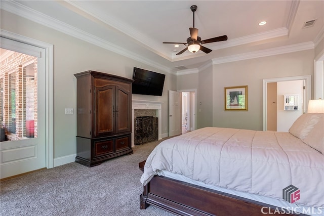 1641 Lane Creek Rd, Bogart, GA 30622 - bedroom featuring a tray ceiling, light colored carpet, ornamental molding, a fireplace, and recessed lighting