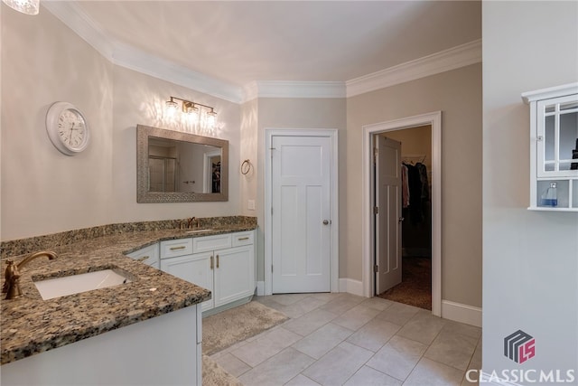 1641 Lane Creek Rd, Bogart, GA 30622 - bathroom with two vanities, crown molding, a walk in closet, and a shower