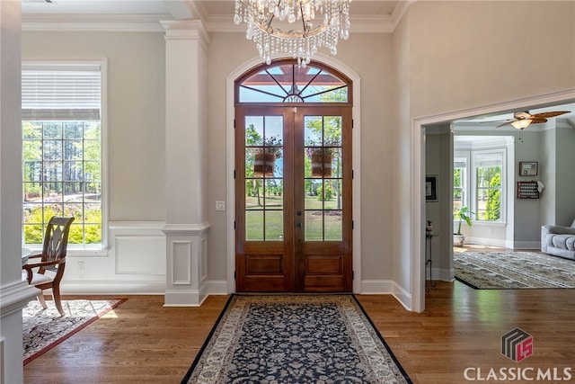 1641 Lane Creek Rd, Bogart, GA 30622 - entrance foyer with wood finished floors, french doors, a chandelier, ornamental molding, and a ceiling fan