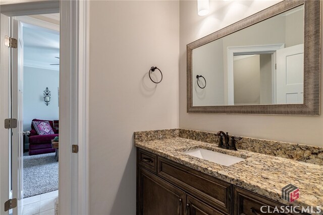 1641 Lane Creek Rd, Bogart, GA 30622 - bathroom with vanity, crown molding, and tile patterned flooring