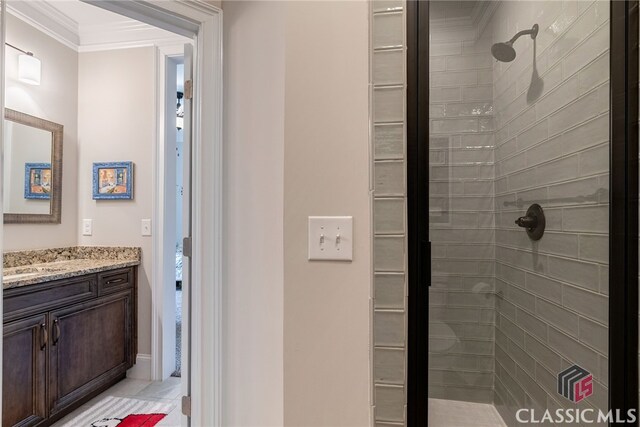 1641 Lane Creek Rd, Bogart, GA 30622 - full bathroom featuring a stall shower, vanity, ornamental molding, and baseboards