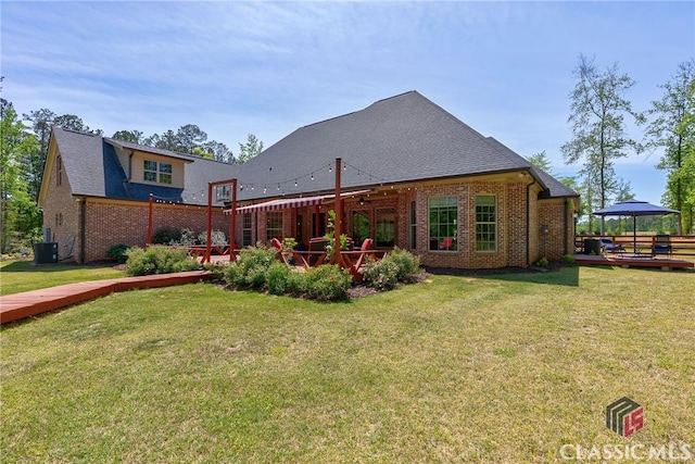 1641 Lane Creek Rd, Bogart, GA 30622 - back of house with brick siding, a wooden deck, a gazebo, central AC, and a yard
