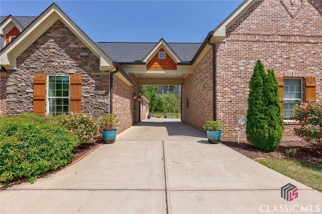 1641 Lane Creek Rd, Bogart, GA 30622 - view of front of home featuring brick siding, stone siding, and concrete driveway