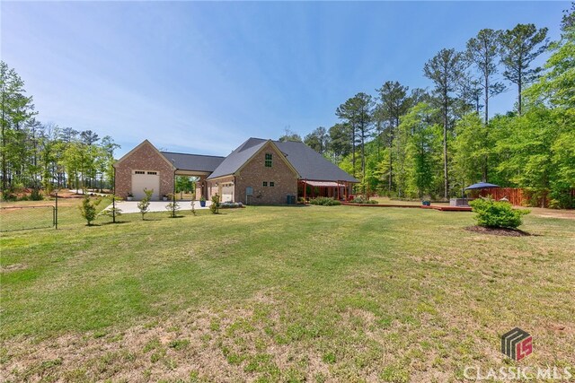 1641 Lane Creek Rd, Bogart, GA 30622 - view of yard with driveway and a garage