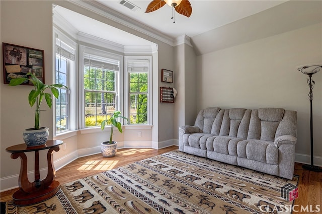 1641 Lane Creek Rd, Bogart, GA 30622 - living room with crown molding, wood finished floors, baseboards, and a ceiling fan