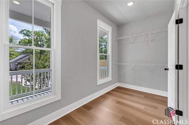 231 Marable St E, Monroe, GA 30655 - spacious closet featuring wood finished floors