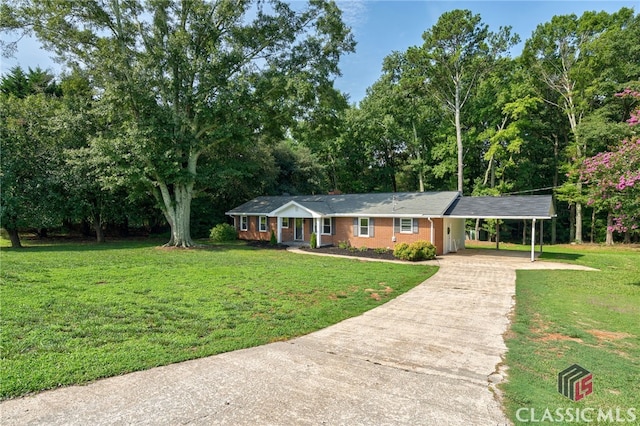 1210 Burr Harris Rd, Watkinsville, GA 30677 - ranch-style house with concrete driveway, a front yard, a carport, and brick siding