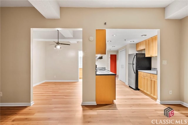 131 E Broad St Unit 506, Athens, GA 30601 - kitchen featuring ceiling fan, light wood finished floors, freestanding refrigerator, light brown cabinetry, and recessed lighting