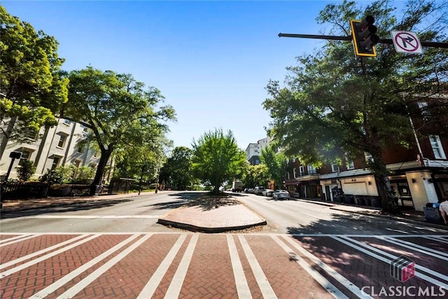 131 E Broad St Unit 506, Athens, GA 30601 - view of asphalt street with sidewalks, curbs, street lights, and a residential view