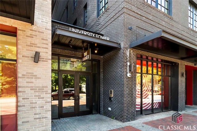 131 E Broad St Unit 506, Athens, GA 30601 - view of exterior entry with french doors and brick siding