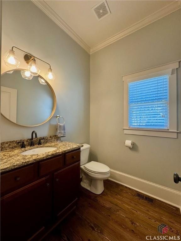 64 Charter Oak Dr, Athens, GA 30607 - bathroom featuring ornamental molding, wood finished floors, vanity, baseboards, and toilet