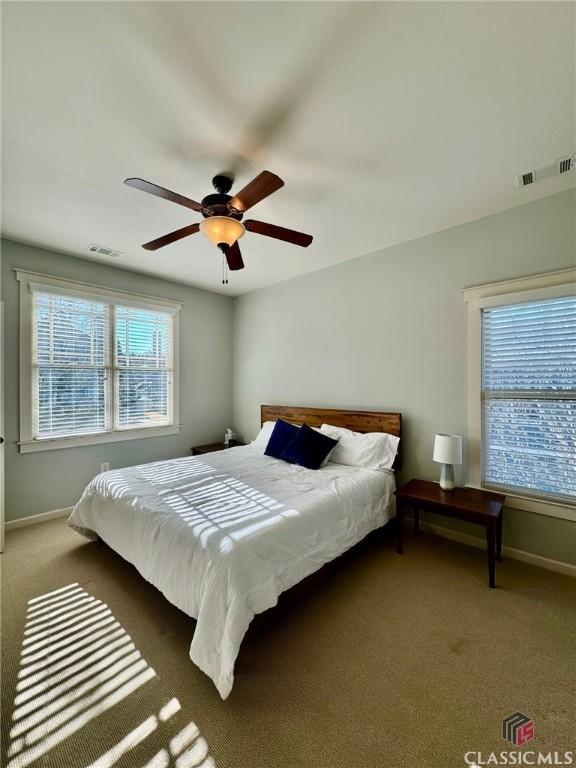 64 Charter Oak Dr, Athens, GA 30607 - carpeted bedroom featuring baseboards and a ceiling fan