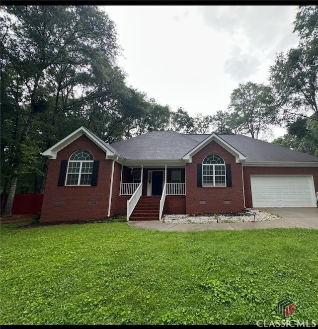 2021 Windfield Dr, Monroe, GA 30655 - ranch-style house featuring crawl space, a porch, brick siding, and an attached garage
