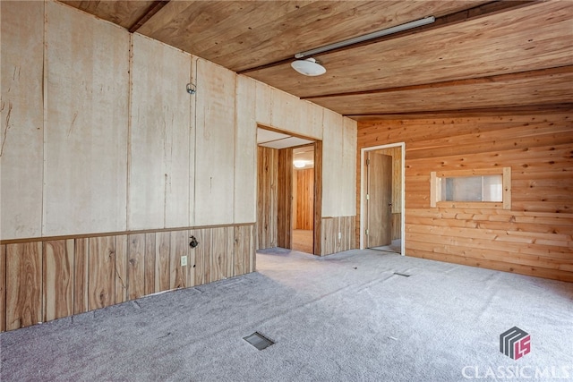 1200 Burr Harris Rd, Watkinsville, GA 30677 - spare room featuring carpet flooring and wood walls