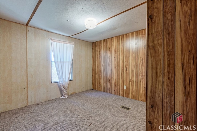 1200 Burr Harris Rd, Watkinsville, GA 30677 - carpeted empty room with wooden walls