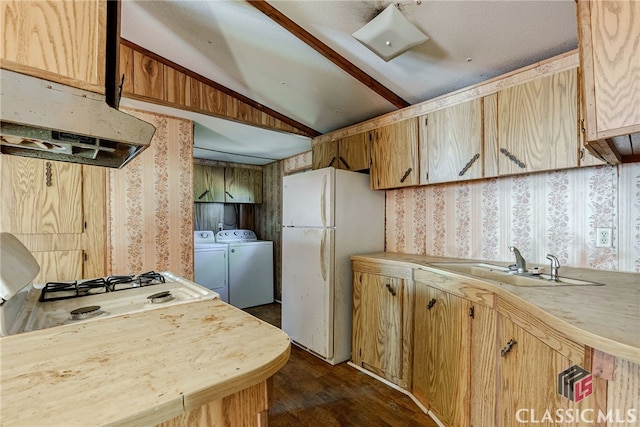 1200 Burr Harris Rd, Watkinsville, GA 30677 - kitchen with freestanding refrigerator, washer and dryer, lofted ceiling, wallpapered walls, and a sink