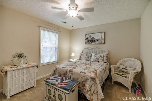 1663 Oconee Pt, Jefferson, GA 30549 - carpeted bedroom with baseboards, a textured ceiling, and a ceiling fan