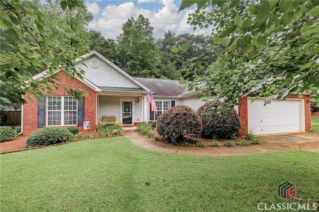 1663 Oconee Pt, Jefferson, GA 30549 - view of front of property featuring brick siding, board and batten siding, a front lawn, and concrete driveway