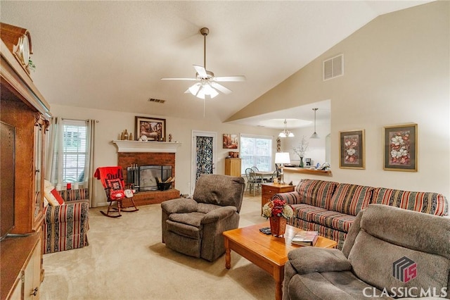 1663 Oconee Pt, Jefferson, GA 30549 - living room featuring light colored carpet, lofted ceiling, a ceiling fan, and a fireplace