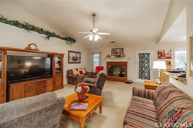 1663 Oconee Pt, Jefferson, GA 30549 - living room featuring vaulted ceiling, light carpet, a ceiling fan, and a brick fireplace
