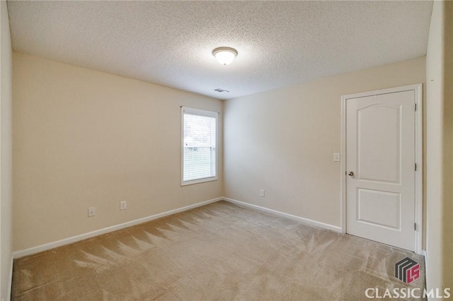 1663 Oconee Pt, Jefferson, GA 30549 - unfurnished room with carpet floors and a textured ceiling