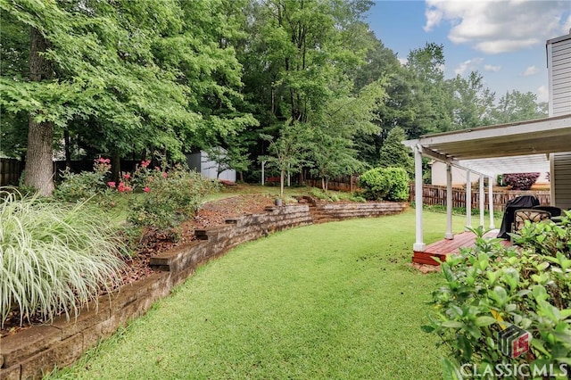 1663 Oconee Pt, Jefferson, GA 30549 - fenced backyard with a storage unit