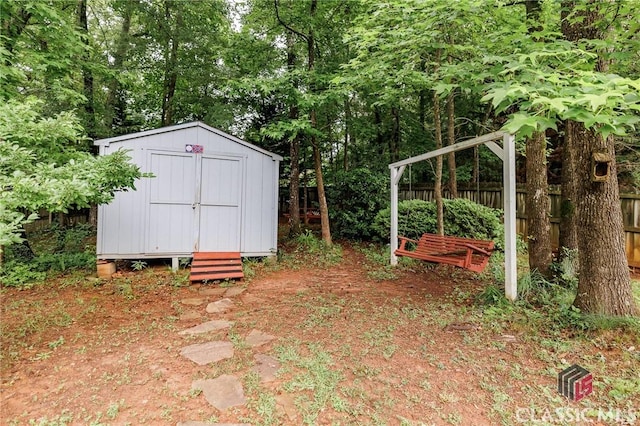 1663 Oconee Pt, Jefferson, GA 30549 - view of yard with a storage unit