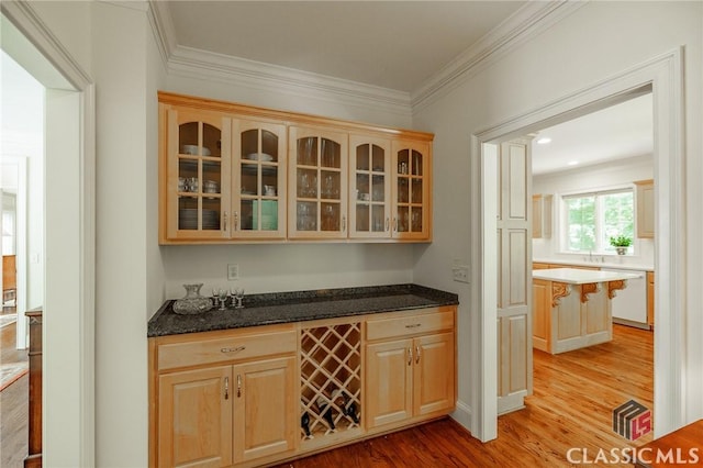 1181 Knob Creek Dr, Athens, GA 30606 - bar with light wood finished floors, crown molding, and dishwasher